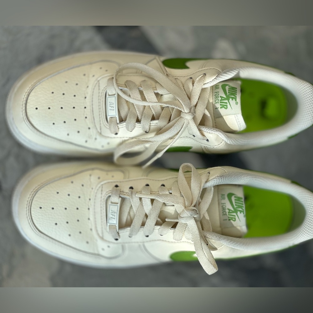 Nike Air Air Force 1 cream and green strip sneakers.